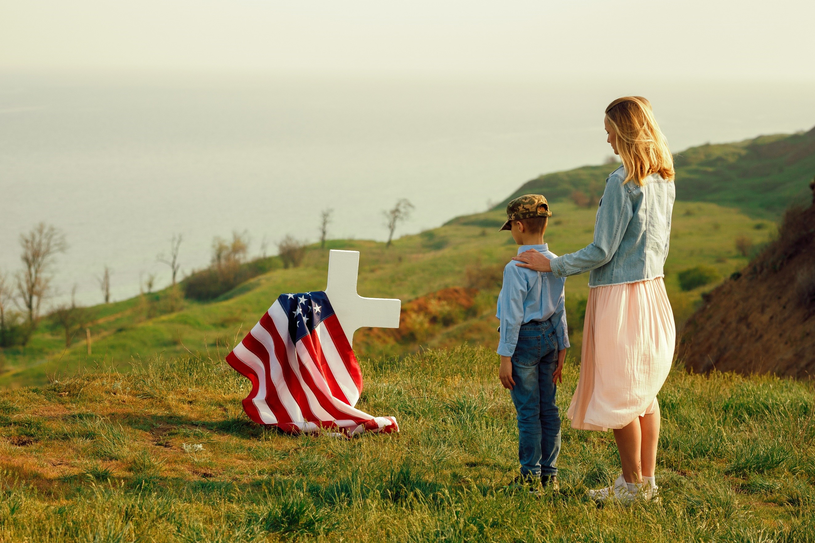 Veteran memorial with mother and child.